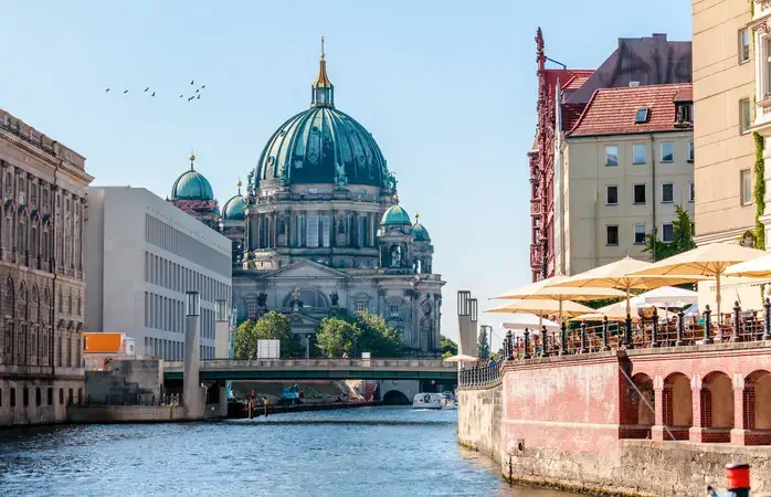 View of Berliner Dom from Spree River, Berlin, Germany.
Image taken outdoors, daylight, in summer.
Incidental people in the image.