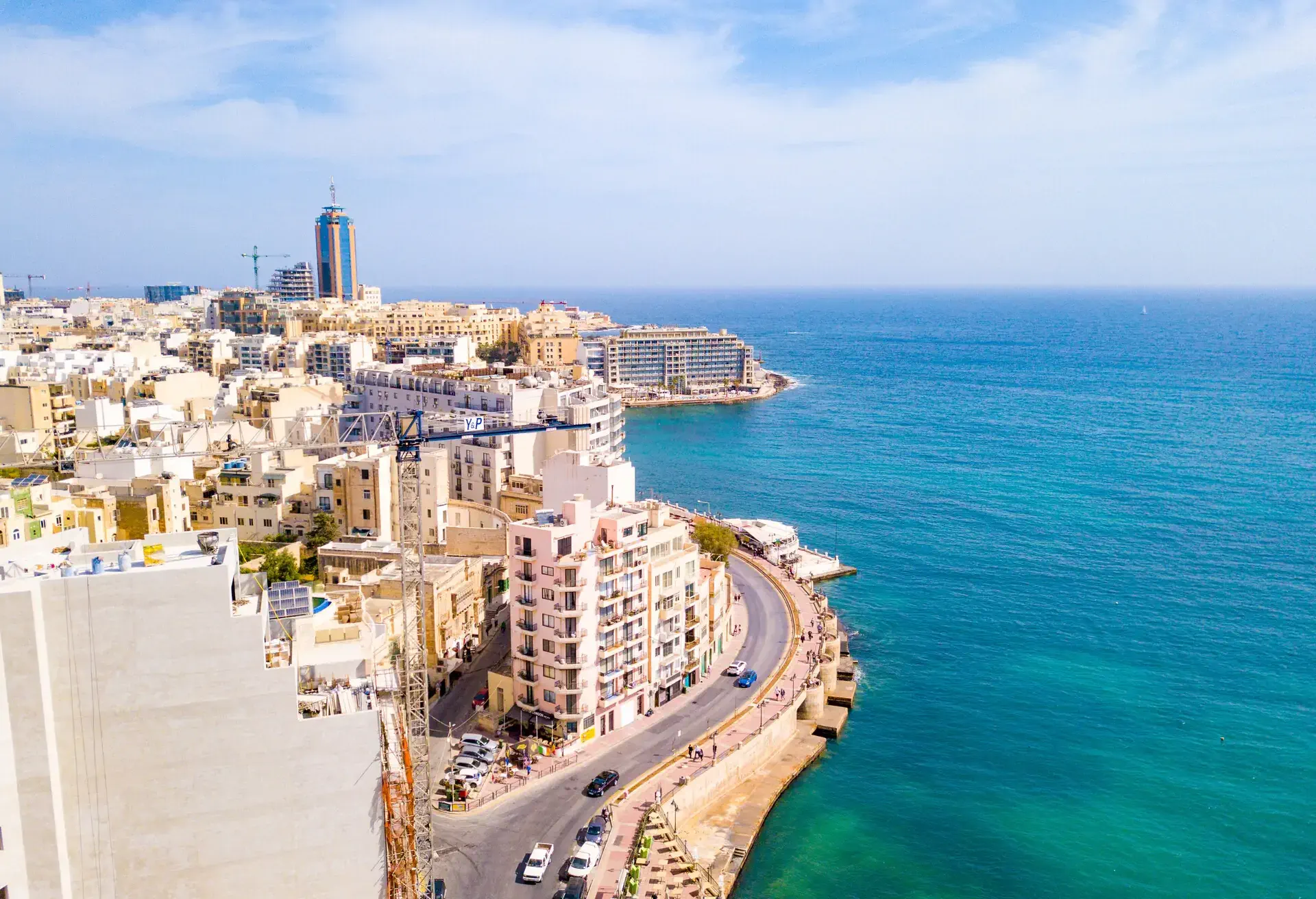 ST.JULIAN'S, MALTA, MAY 15, 2018 - Aerial view on the Spinola Bay with outside pool in St.Julian's from above - St.Julian's, Malta